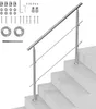 A stainless steel handrail system installed on concrete stairs, with various mounting hardware components laid out on a white background. Podgląd zdjęcia produktu