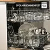 Inside of a dishwasher with glass jars and plates. Podgląd zdjęcia produktu
