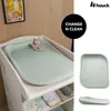 A baby changing mat on a changing table, with product shots and branding. Anteprima dell’immagine prodotto