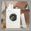 A laundry room scene with a washing machine, laundry detergent, a plant, and an ironing board with an iron. Produktbild-Vorschau