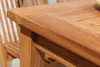 Close-up of a wooden garden table and chairs. Produktbild-Vorschau