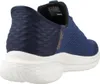 A side view of a blue Skechers slip-on sneaker with a white sole. Voir les images du produit