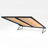 A bed frame with an open gas lift mechanism, showing the slatted mattress base. Produktbild-Vorschau