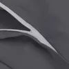 A close-up view of a gray fabric with a white zipper. Produktbild-Vorschau