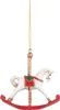 A white rocking horse Christmas ornament with red and gold accents is shown hanging from a gold chain against a white background. Náhled obrázku produktu
