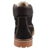 The back view of a black leather boot with a brown collar and a tan sole. Voir les images du produit