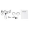 A bathroom faucet and its accessories are laid out on a white background. Podgląd zdjęcia produktu