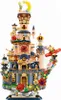 A detailed model of a whimsical castle with a teapot-shaped base, adorned with flowers and a small airplane. Produktbild-Vorschau