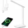 A white LED desk lamp is shown with a USB-C cable and a smartphone charging. Anteprima dell’immagine prodotto