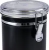 Close-up of the top of a black storage container with a clear lid and silver latch. Podgląd zdjęcia produktu