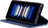 A blue flip case for a smartphone is shown open, with the phone inside displaying a colorful wallpaper. Produktbild-Vorschau