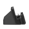 A black docking station is shown from the side against a white background. Podgląd zdjęcia produktu