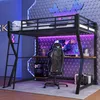 A gaming-themed loft bed setup with a desk, computer, and chair underneath, illuminated by purple LED lights. Podgląd zdjęcia produktu