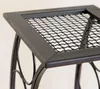 Close-up of the top of a black metal wine rack with a mesh surface. Anteprima dell’immagine prodotto