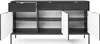 A black sideboard with fluted fronts and gold handles, shown with its doors and one drawer open to reveal the interior shelves. Produktbild-Vorschau