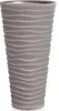 A tall, gray planter with a wavy texture. Náhľad obrázku produktu