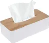A white tissue box with a bamboo lid, with tissues emerging from the opening. Náhled obrázku produktu