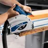 A person is using a circular saw on a piece of wood. Produktbild-Vorschau