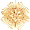 A straw star ornament, likely for Christmas decoration. Produktbild-Vorschau