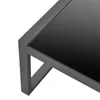 A close-up view of the corner of a modern outdoor lounge set, showing the dark glass tabletop and the gray metal frame. Produktbild-Vorschau
