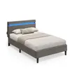 A gray upholstered bed with a blue LED light strip on the headboard, set against a white background. Náhled obrázku produktu