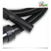 A close-up of a black vacuum cleaner hose with connectors. Produktbild-Vorschau