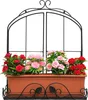 A black metal window flower holder with artificial red and pink flowers. Produktbild-Vorschau