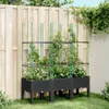 A raised garden bed with a trellis structure, filled with plants, is set against a wooden fence in a backyard setting. Produktbild-Vorschau