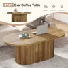 A coffee table is shown in a living room setting with a couch and blanket. Voir les images du produit