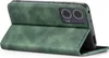 A green flip case for a smartphone is shown open, propped up to display the phone's camera module. Produktbild-Vorschau