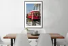 MuchoWow® Gerahmtes Poster Eine rote Straßenbahn befördert Produktbild-Vorschau 3