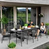 A group of people are enjoying a meal at a table on a patio. Náhled obrázku produktu