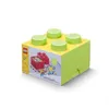 A LEGO storage box shaped like a large LEGO brick, with smaller LEGO bricks inside. Produktbild-Vorschau