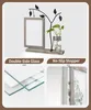 A product image showcasing a wooden picture frame with a decorative metal tree and a glass vase with a plant. The image is divided into sections highlighting features like double-sided glass and a no-slip stopper. Produktbild-Vorschau