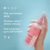 A hand holding a pink spray bottle with water droplets on it, against a light blue background with text describing product features. Náhľad obrázku produktu