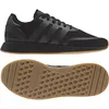 A pair of black Adidas sneakers shown from the side and underneath. Produktbild-Vorschau