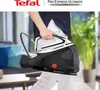 A person is holding a Tefal Pro Express Ultimate steam ironing station. Náhľad obrázku produktu