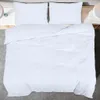A top-down view of a white duvet and two white pillowcases on a bed. Produktbild-Vorschau
