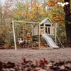 Children playing on a wooden playground in an autumn forest. Produktbild-Vorschau
