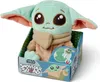 A plush toy of Grogu from Star Wars, presented in its retail packaging. Voir les images du produit
