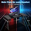 A gaming desk setup with a monitor, keyboard, and accessories, presented with dynamic lighting and overlaid text. Produktbild-Vorschau