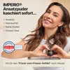 A woman is holding a small container of hair product and smiling. Produktbild-Vorschau