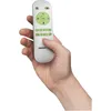 A hand holding a white remote control with green buttons. Produktbild-Vorschau
