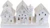A white wooden Christmas village scene with illuminated houses, trees, and figures. Podgląd zdjęcia produktu