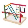 A colorful bird playground with ladders, swings, and a rope, set in a wooden tray. Náhled obrázku produktu