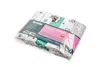 A package of baby muslin cloths with various animal and star patterns. Produktbild-Vorschau
