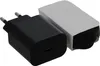 A black USB-C charger and a coiled USB-C cable in a white box. Produktbild-Vorschau