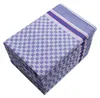 A stack of folded blue checkered kitchen towels with red and blue stripes on top. Produktbild-Vorschau