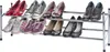 A two-tier chrome shoe rack filled with various types of shoes. Produktbild-Vorschau