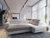 A modern living room with a large sectional sofa, dining area, and kitchen in the background. Produktbild-Vorschau